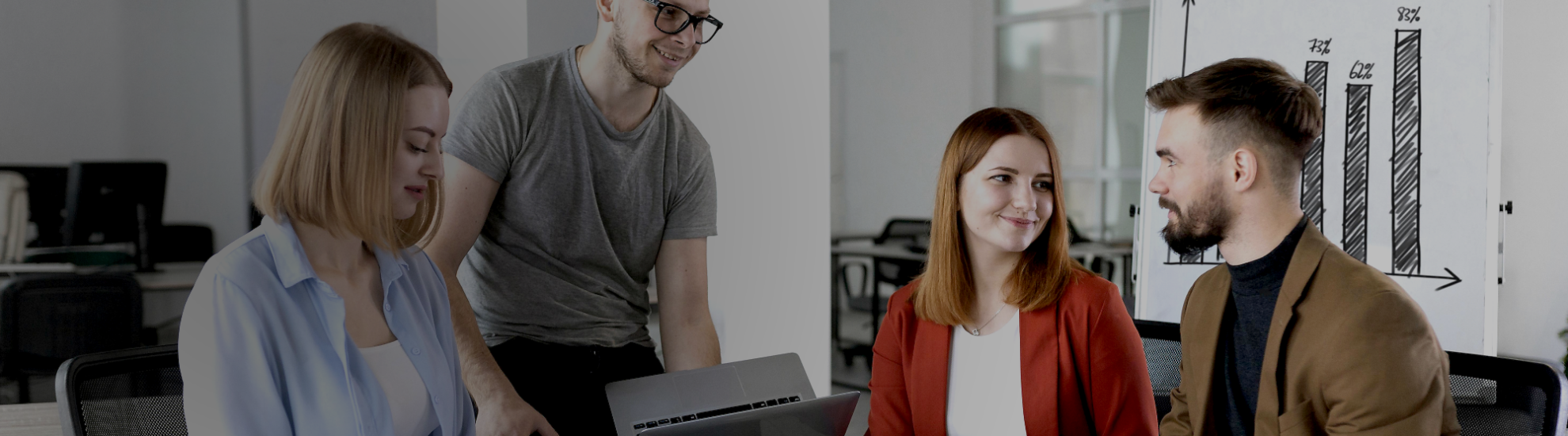 This image captures two members of Weblook’s professional design team mid-conversation, embodying the collaborative spirit and expertise that clients can expect from Weblook’s web design services in Sri Lanka.